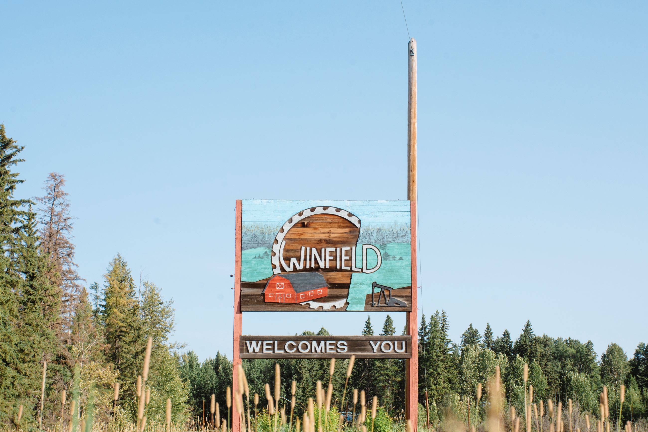 Hamlet of Winfield Sign with Sky